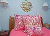This bedroom also includes the master bath as well as a door that leads out to the screened porch.  Cable TV as well