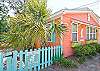 Front exterior of The Shrimp Cottage.  This cottage is located next door to Key Lime Parrot; renting both would be perfect for large families or groups!