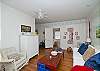 Includes cable TV, a dining room table, hardwood floors, lots of natural light.