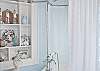 The master bathroom has a claw-foot bathtub ( with shower and shower curtain). This bathroom is just off the master bedroom and full of wonderful bath salts and special details.