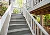 Door and staircase outside from the enclosed porch off of ktichen.