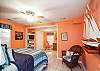 This bedroom has plenty of room to not only sleep, but to relax and have some extra privacy.