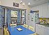 Bright, cheerful kitchen with fun, beachy details!