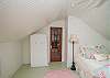 Queen size bedroom on 3rd floor with water view.