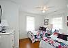Our cheerful bedroom! Red, white and nautical blue!  One double and one twin bed.