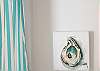 Bellamy oyster shell art in dining area.