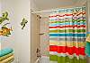 Colorful beachy bathroom!  This is hall bathroom upstairs.