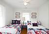 Our cheerful bedroom! Red, white and nautical blue!  One double and one twin bed.