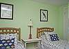 We have two bedrooms on the first floor. This is the bedroom with the 2 twin beds.