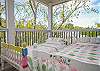 The second floor porch is also a sleeping porch. we have 2 twin beds ( we don't include this in the bed count or beds) for anyone to relax, read and even sleep outside in the fresh air!