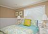 The back studio apartment is up a staircase in the back courtyard and is truly worth the climb! The bed is a Queen bed with wonderful bedding and linens!