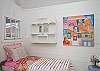 The back cottage is a little haven. Great for lounging or kids that want to "glamp" (glamour camp!) Two twin beds, AC, bright and cheerful local art and unique cottage decor.