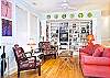 The living room is really one large room with the fireplace, dining area and open kitchen.  Just terrific space to enjoy the cottage!
