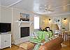 One large room with lots of purposes!  Hardwood floors and lots of natural light