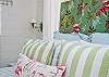 Another view of queen bedroom with barkcloth headboard.