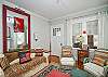 Views of the living room area; lots of comfy seating and great details!