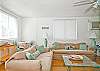 The delightfully bright, open living space includes kitchen and dining areas along with comfy furniture, flat screen TV, dvd player, cable TV service and complimentary WiFi.