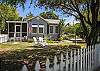 Additional views of the adorable Blue Heron Cottage; white picket fence; great location; great for pets and children!