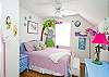 Upstairs bedroom #1:  features a double bed and fun wall art; lavender and blue color scheme!