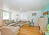 The delightfully bright, open living space includes kitchen and dining areas along with comfy furniture, flat screen TV, dvd player, cable TV service and complimentary WiFi.