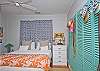 Master bedroom with king-size bed and loads of color and character!