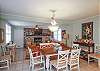 A Mermaid's Tale Cottage is ready to welcome you! This is our dining room area looking towards the living room space. We take great pride in our very special beach homes and we love to welcome everyone!