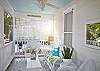 Sunny front screened porch.