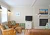 One large room with lots of purposes!  Hardwood floors and lots of natural light