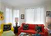 Another view of the bright, beachy living room!