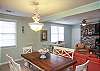 A Mermaid's Tale Cottage is ready to welcome you! This is our dining room area looking towards the living room space. We take great pride in our very special beach homes and we love to welcome everyone!
