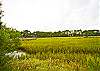 We overlook the magical salt marsh. Bird watching, the sounds of the oysters clacking, the wind blowing thru the spartina grass- all parts of the sounds of Crabby Pirate