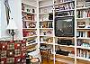 The living room is really one large room with the fireplace, dining area and open kitchen.  Just terrific space to enjoy the cottage!