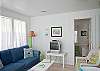 Door here off of living area leads to first bedroom; this bedroom has 2 twin beds.