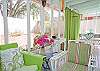 Our screened porch continues to get better and better. Lime green outdoor curtains, lots of seating- even "Phil" a vintage pink refrigerator from the 1950's Mary Kay restored. Ready to hold all those beachy themed beverages!