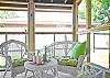 Great screened porch; an ideal place to hang out, have a cup of Mermaid Morning Bliss coffee, meals or evening cocktails!