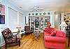 The living room is really one large room with the fireplace, dining area and open kitchen.  Just terrific space to enjoy the cottage!