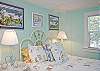 The 2nd floor bedroom features a double bed.