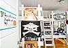 Downstairs bedroom #2.  Bunk beds on bottom; top of beds are for play; not a sleeping area.  Perfect pirate decor!