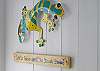 Gecko wall art in kitchen.