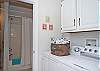 Laundry area off of bathroom.