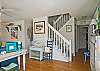 Large, open, bright family room with denim beach-friendly furniture &amp; flatscreen TV.