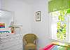 Another view of the bright, colorful Bedroom #3!
