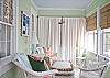 When you walk in the front door, you walk into the old porch which has been enclosed and now the front sun room. Fully heated and air conditioned.