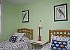 We have two bedrooms on the first floor. This is the bedroom with the 2 twin beds.