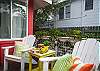 The front of the cottage has this private ouside seating area. Perfect to enjoy the sun and relax.