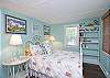 The 2nd floor bedroom features a double bed.