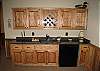 The Wet Bar is located in the family room next to the Pool Table.