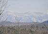 Enjoy a Beautiful Long Range Mountain View from the cabin.  This is a view of Brasstown Bald on a snowy wintery day.