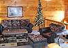Relax n the loft area of the cabin.  Great for quiet time with a book or watch your favorite TV show on the Flatscreen TV