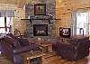 Living Room is beautifully furnished with Leather Sofas for a relaxing evening.
